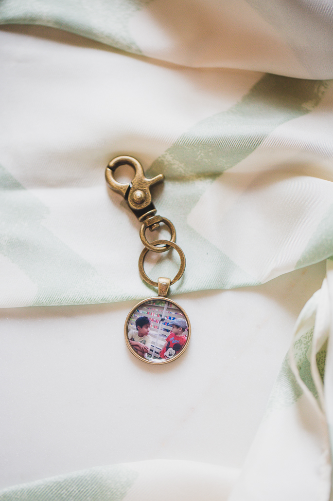 The Ozzie Locket Clip Pendant with photo of two cousins inside