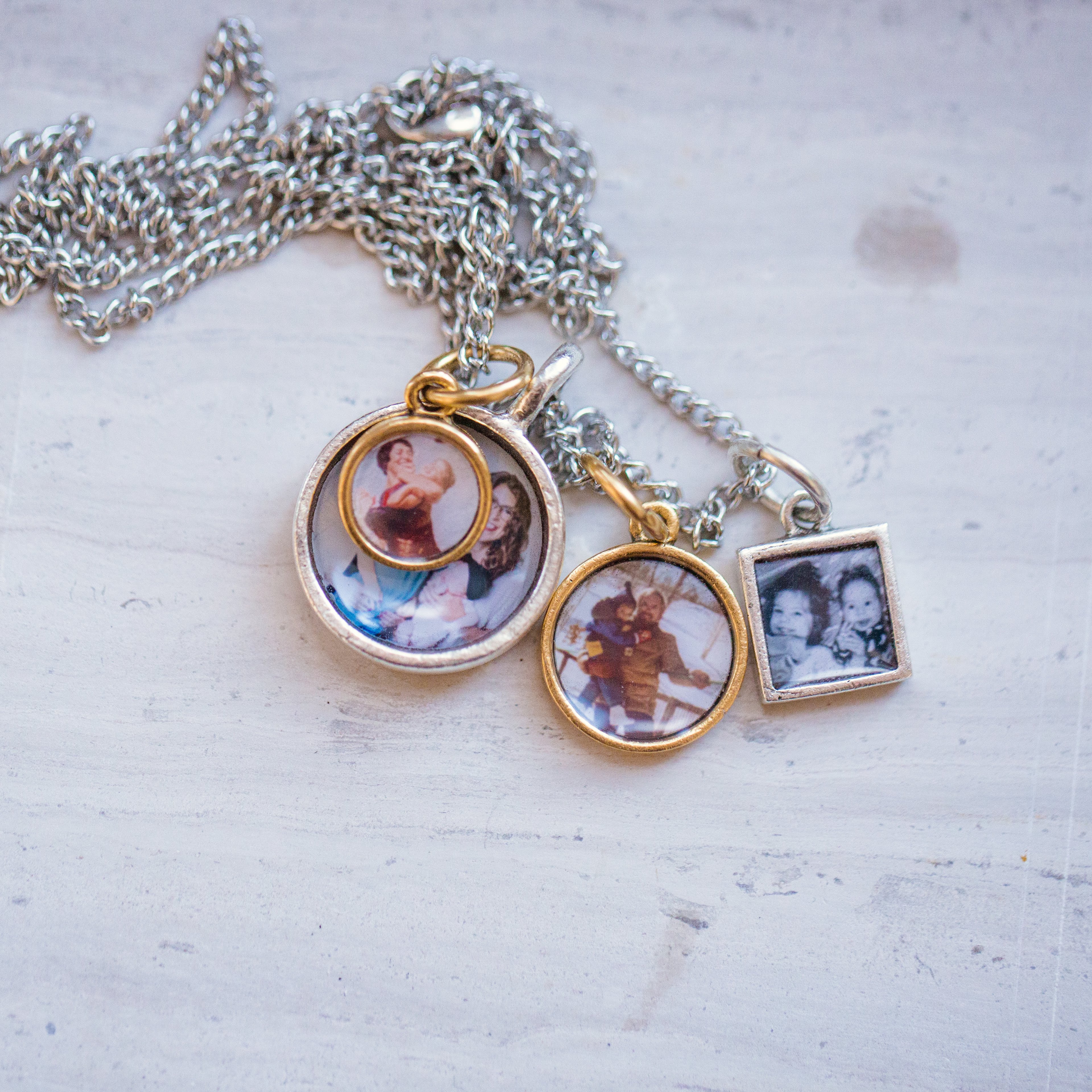 The Charm Locket with Four Photos Placed Inside