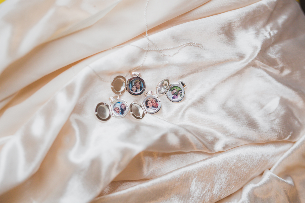 four little circle lockets, one for her daughter and three nieces, each with a photo of them with their grandmother as she passed this year