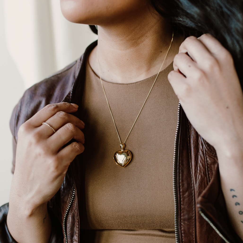 Large Gold Heart Locket holding photos