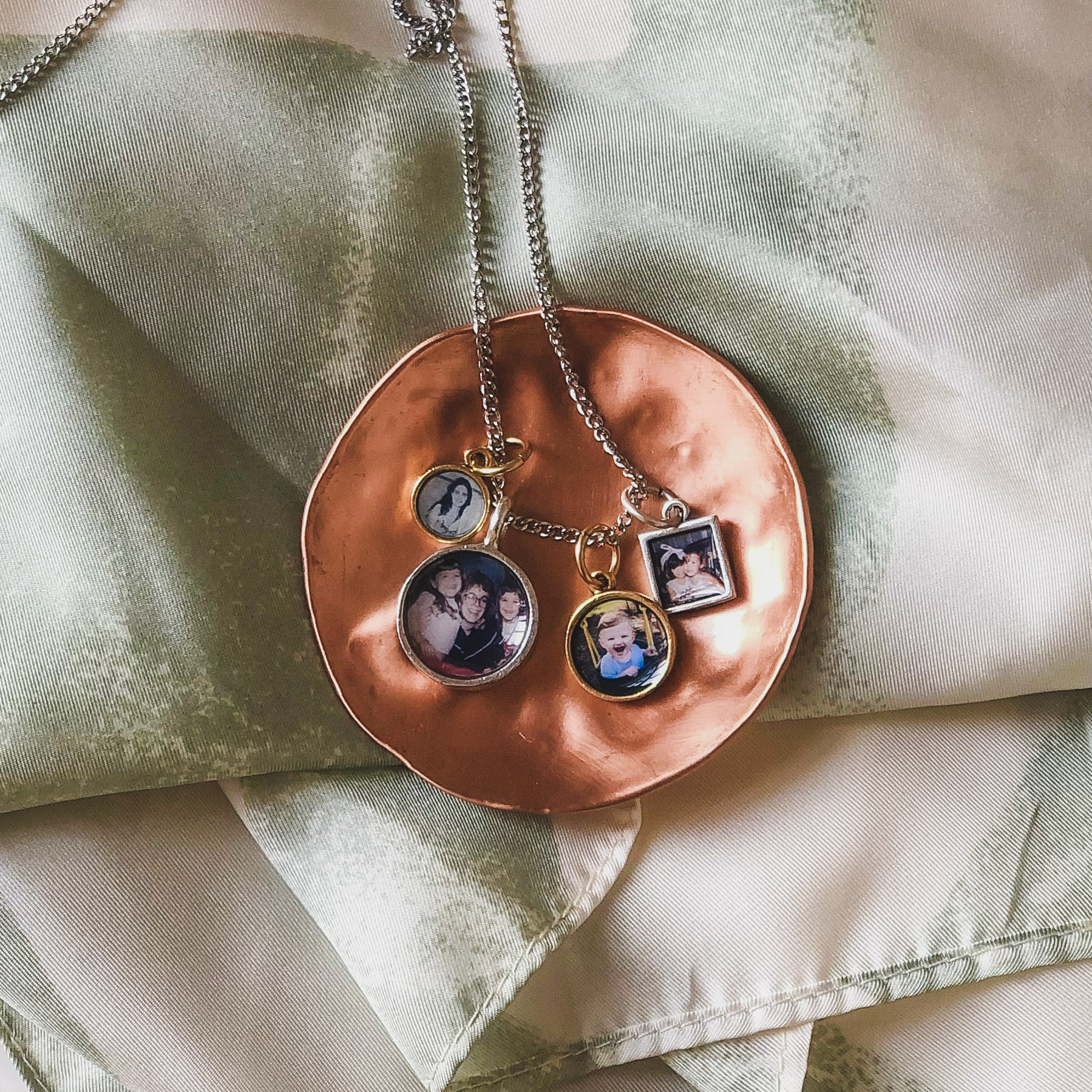 mixed metal charm locket with photos in four lockets for sister