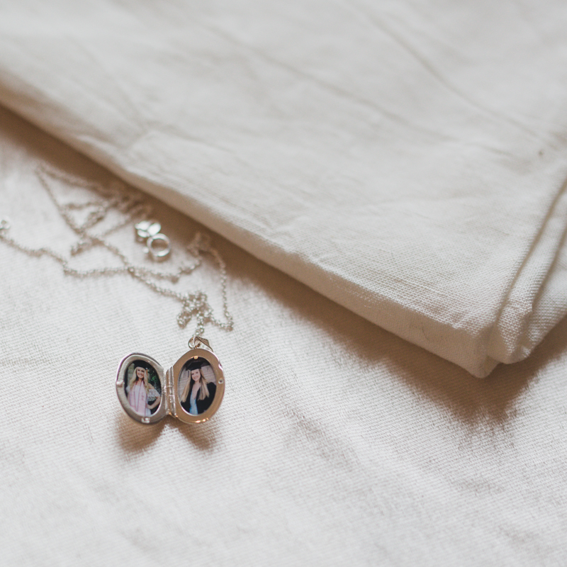 a thank you photo locket for their mom for helping them through college