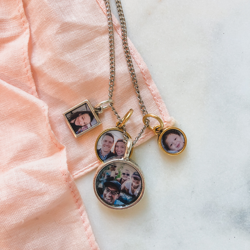 charm locket for mother-in-law with four photos of her children and grandkids
