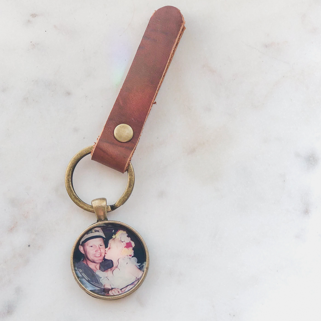 grief gift for herself since her Dad's passing, a leather keychain locket