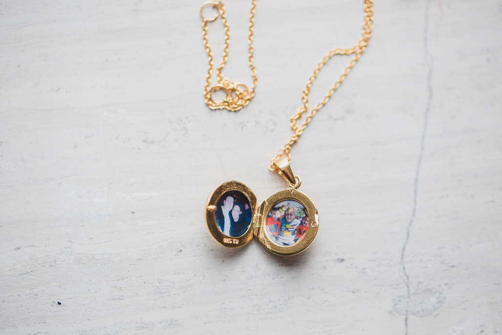 little gold circle locket with two photographs after husband died of cancer