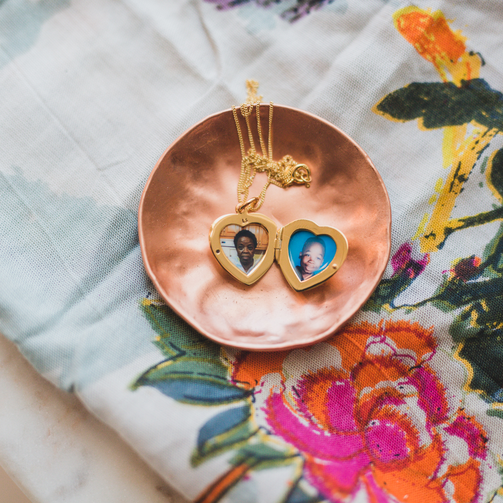 petite gold heart locket named for the meow meow foundation's Roxie Belle with two photos inside