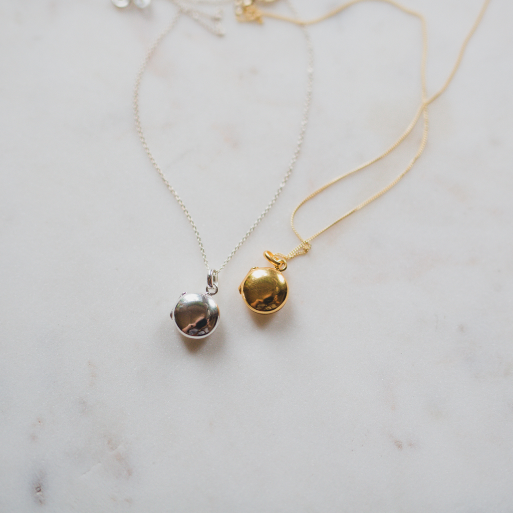 gold and silver lockets that hold one or two photos and are perfect gifts for mothers day, graduation, weddings, grief, loss, inspiration, milestones and growth