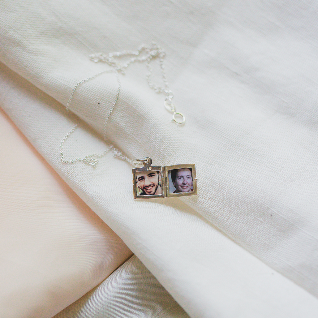 small square double photo locket in silver with photo of friend and grandmother inside