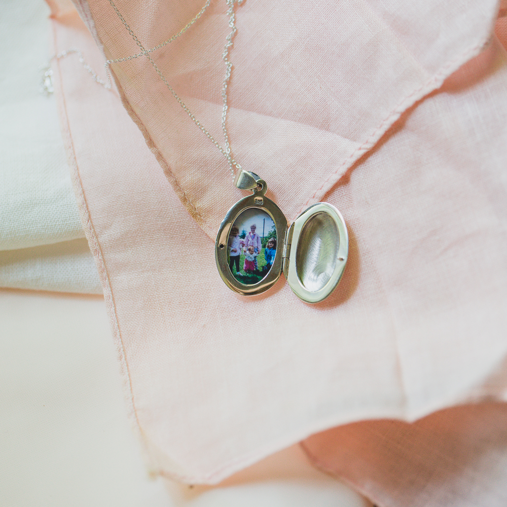 silver oval locket with sisters from 1993
