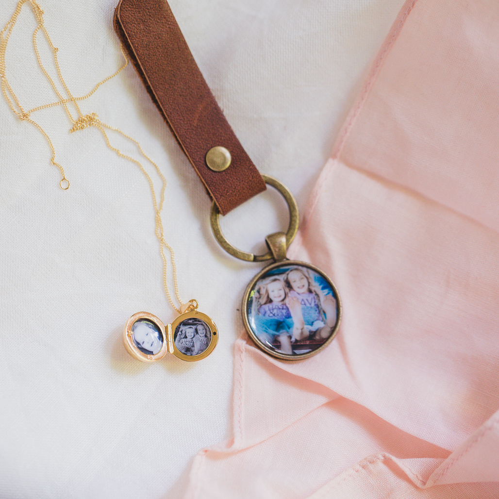 gold disco ball locket with two photos of sisters