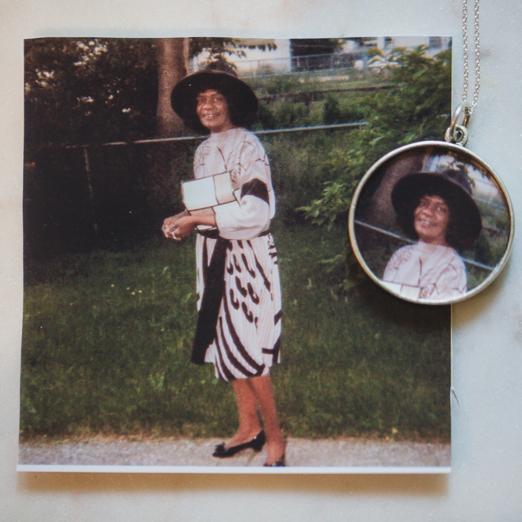 photo of grandmother's smiling face in a silver addie locket from the locket sisters