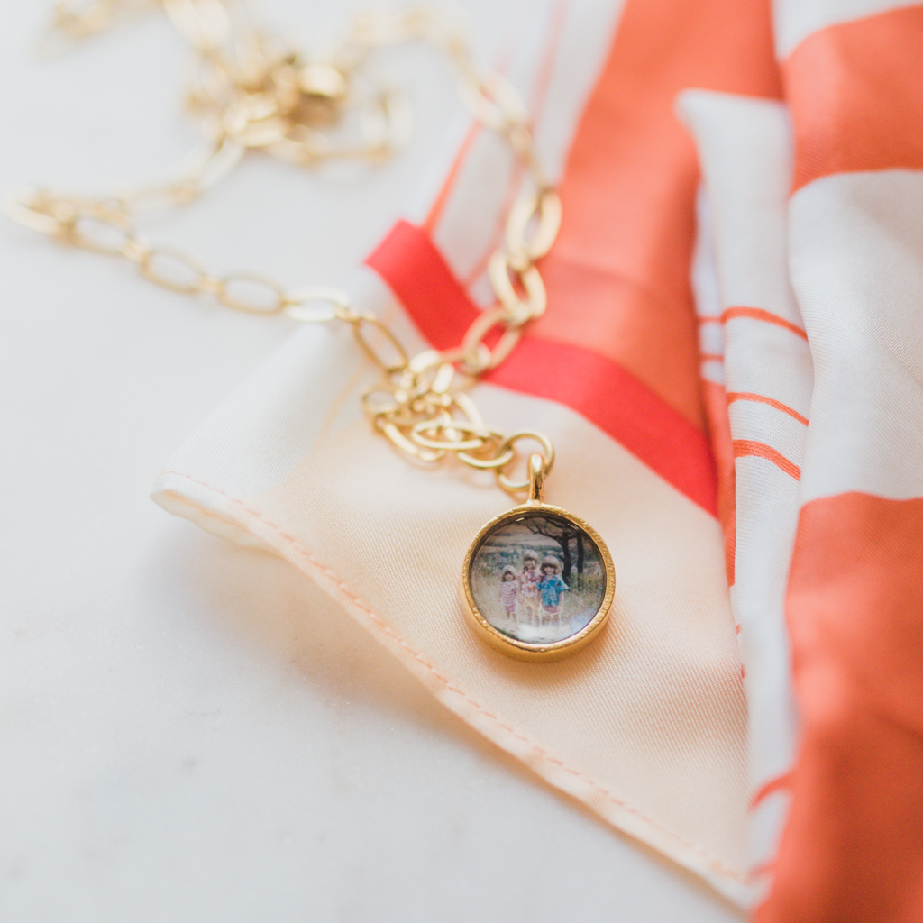 for her sister, a gold locket with an old photo from their childhood